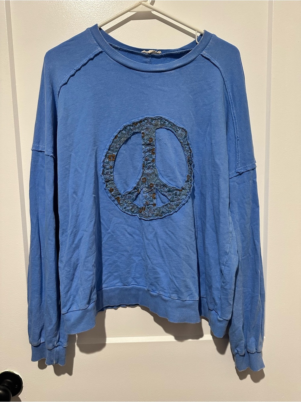 easel Blue Crewneck Sweatshirt with Peace Appliqué